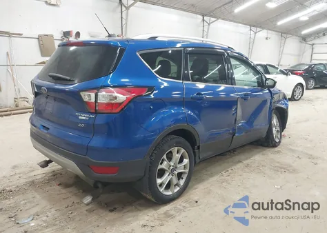 2017 Ford Escape Titanium z USA, uszkodzony, nr VIN 1FMCU9J90HUF10075